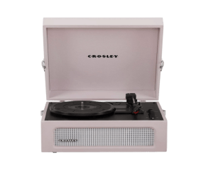 A pink Crosley Voyager turntable with an open lid, featuring built-in speakers and a modern, minimalist design.