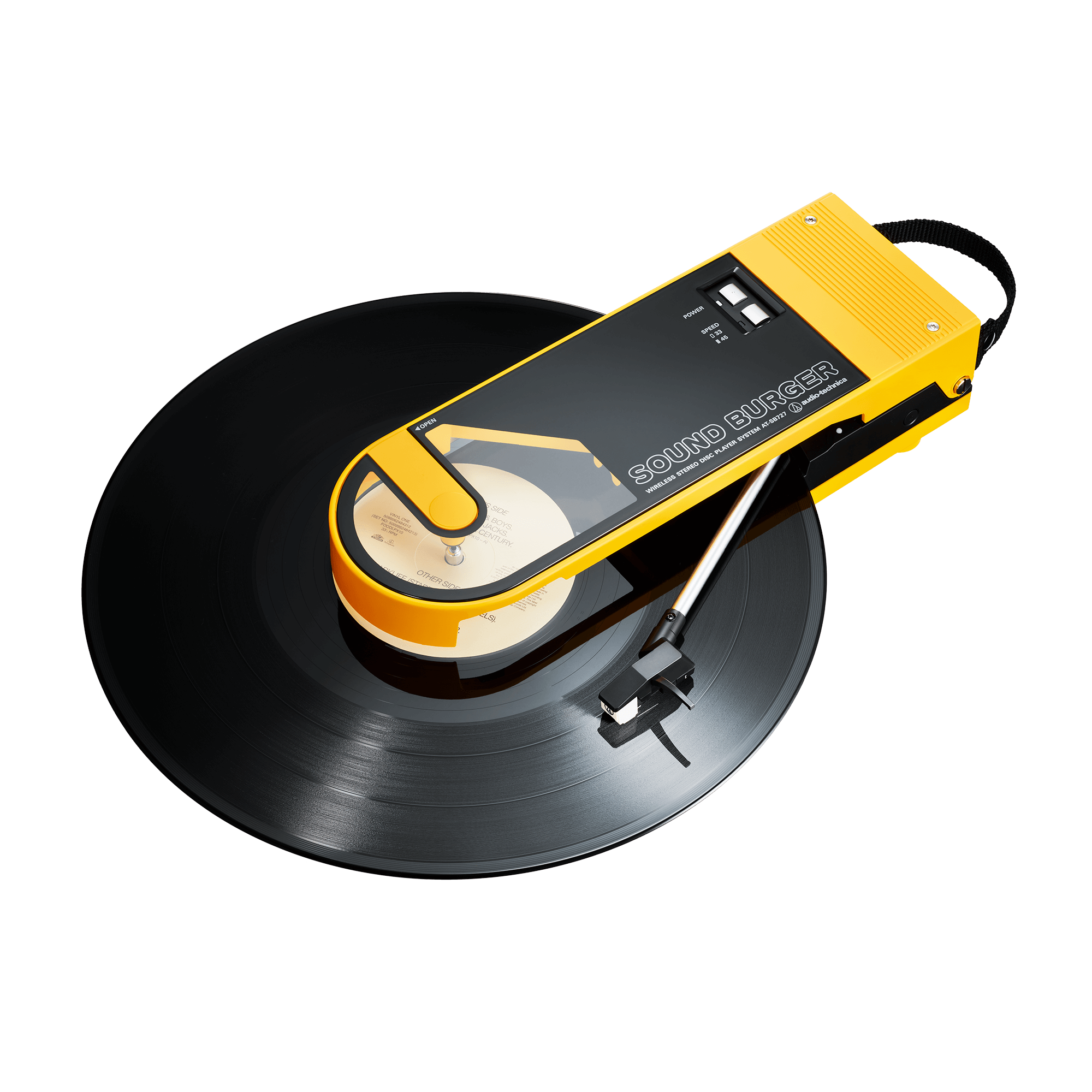 Audio-Technica SoundBurger portable record player in bright yellow, playing a black vinyl record with a compact and retro design.