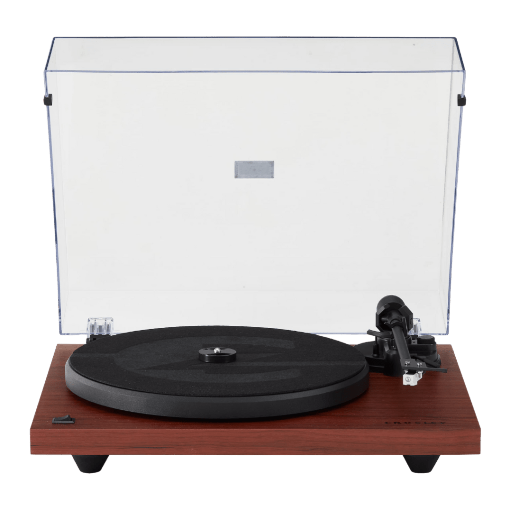 Front view of a Crosley C6 turntable with an open clear dust cover, matte black platter with felt mat, straight tonearm with mounted cartridge, and a wood-finish plinth in rich mahogany color. Ask ChatGPT