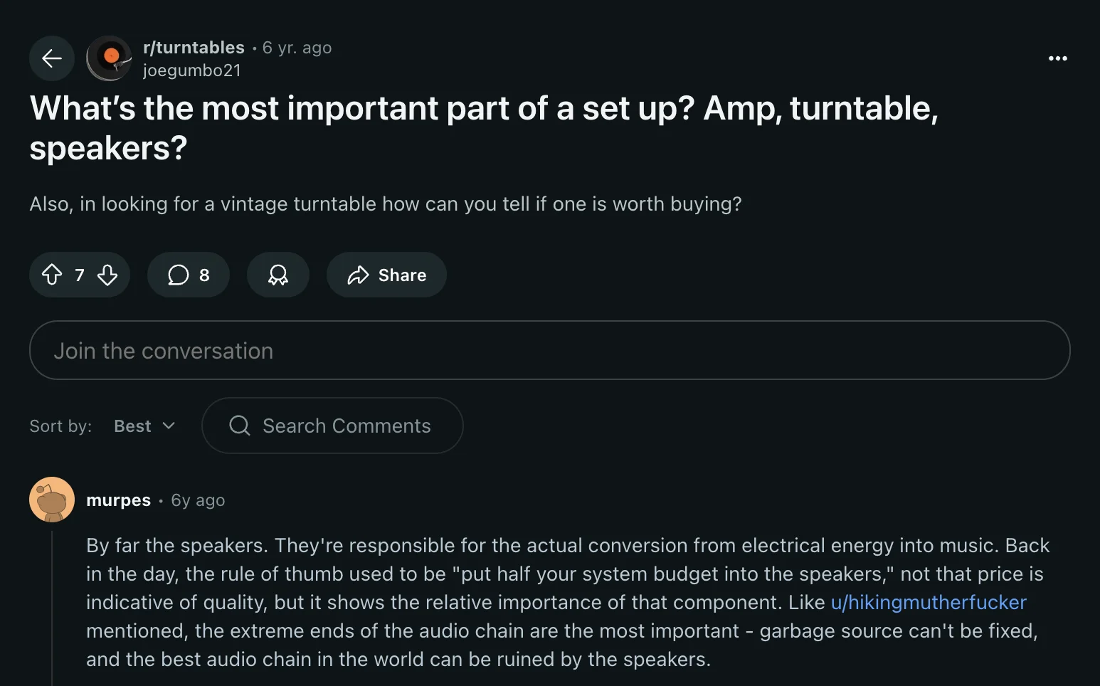 Screenshot of a Reddit post in the r/turntables community asking ‘What’s the most important part of a set up? Amp, turntable, speakers?’ with a top comment stating that speakers are most important, as they convert electrical energy into music and can make or break an audio system.