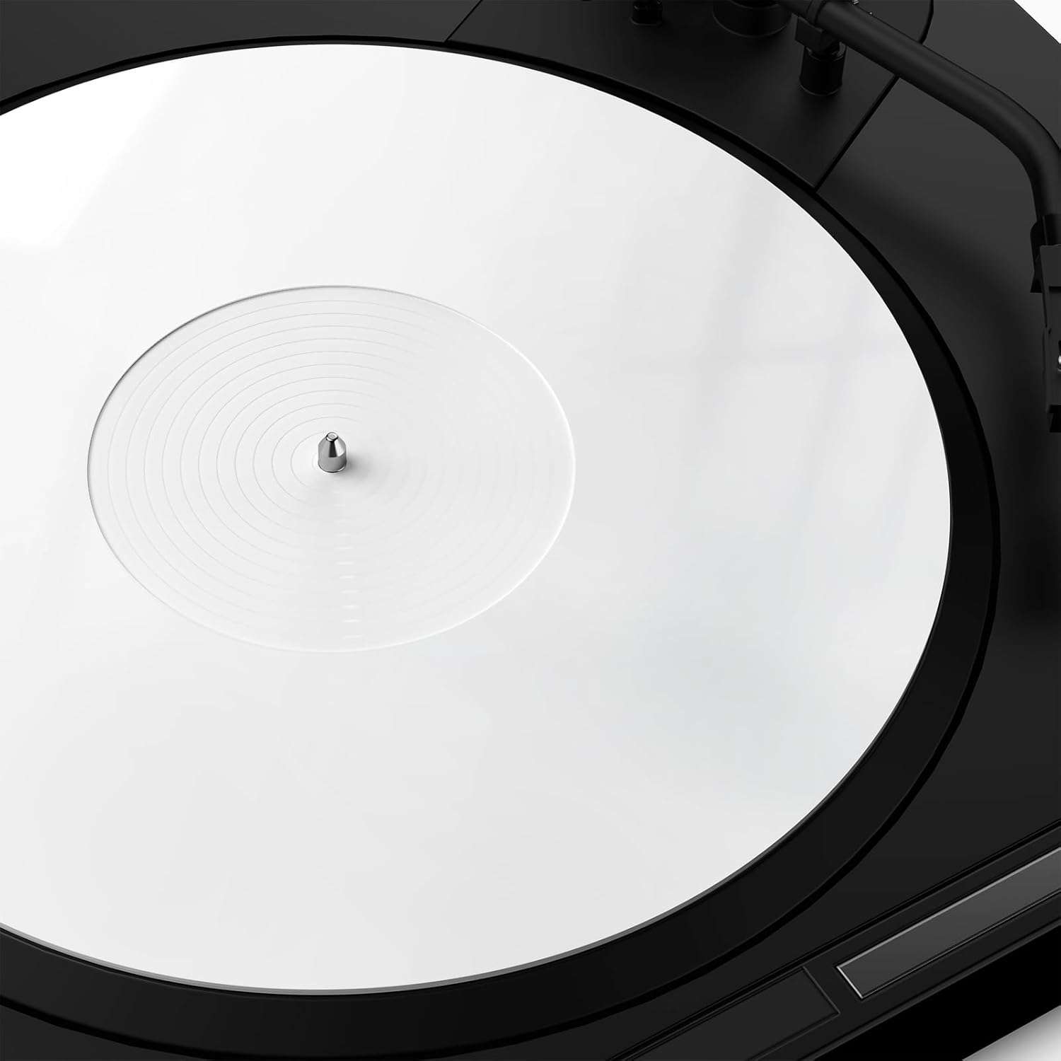 White TAKMORK slipmat for turntables with concentric grooves to reduce static and vibration.