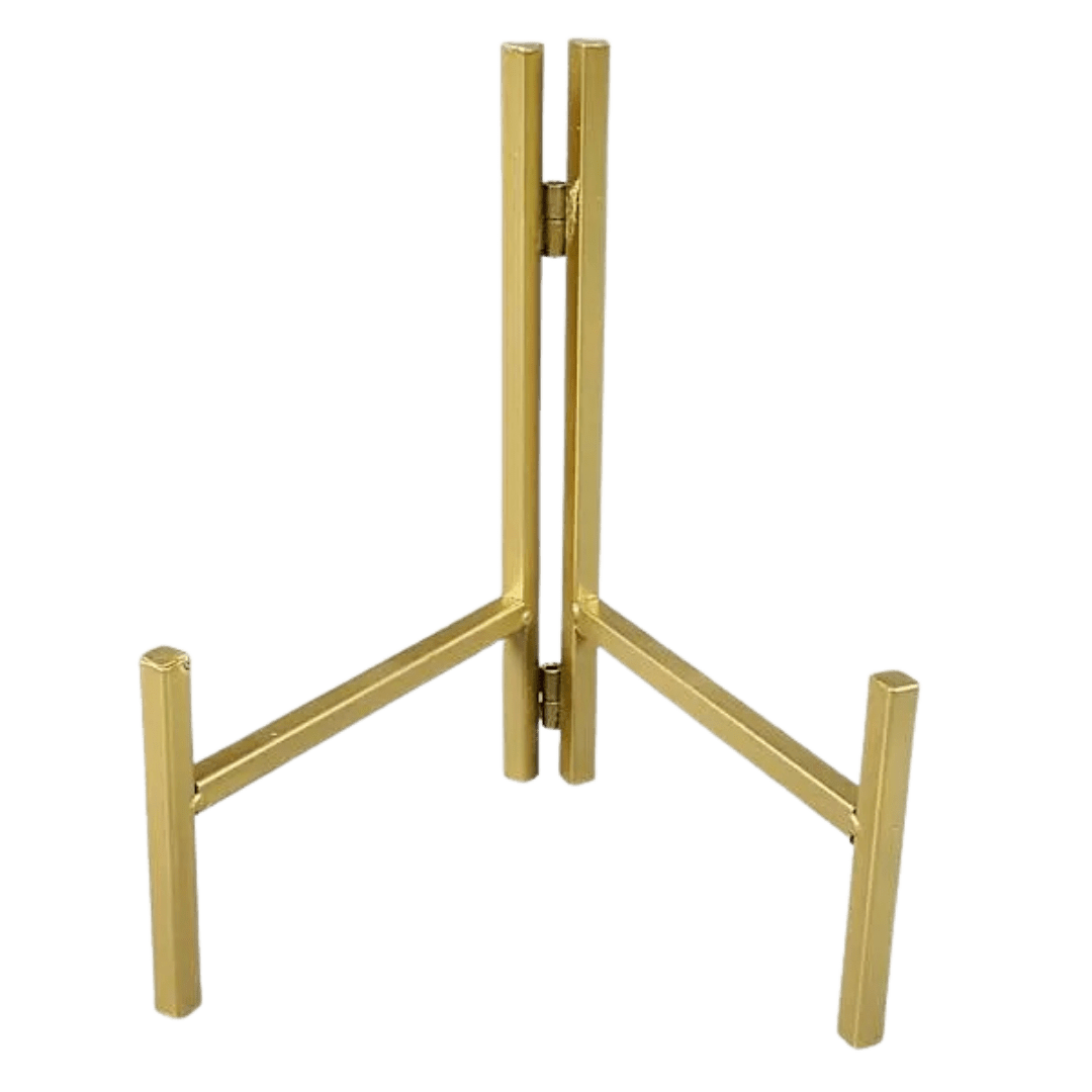 Gold metal tabletop easel stand for displaying vinyl records or artwork upright.