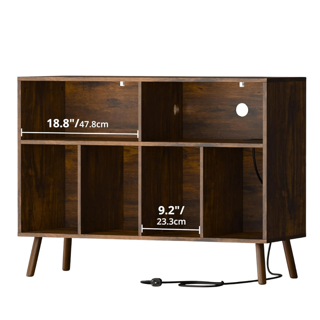 Cozy Castle record player stand in dark walnut with mid-century legs, six storage cubbies, rear cable grommet, and labeled dimensions: top shelf compartment 18.8” (47.8 cm) wide and lower cubbies 9.2” (23.3 cm) wide.