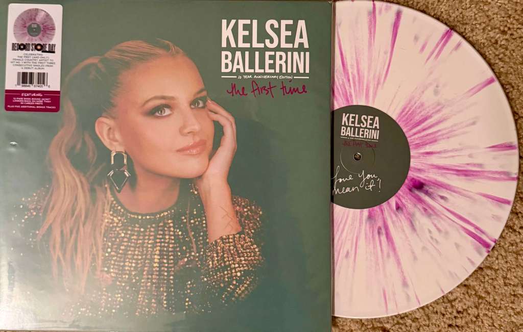 Kelsea Ballerini’s “The First Time” 10th Anniversary Edition vinyl, featuring her portrait on the cover and a white-and-purple splatter pressing beside it, marked with a Record Store Day sticker.